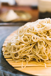 Close-up of noodles in plate on table