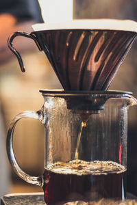 Close-up of coffee cup on table