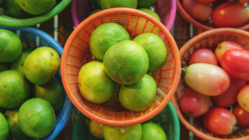 High angle view of fruits in basket at market stall