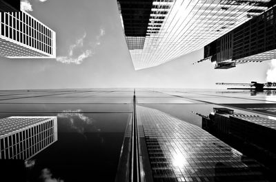 Directly below shot of modern buildings against sky