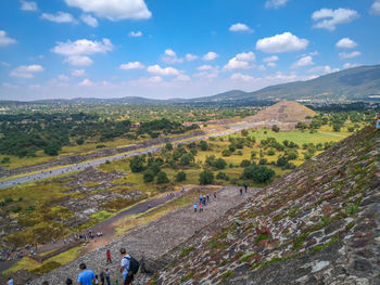 Scenic view of landscape and mountains against sky