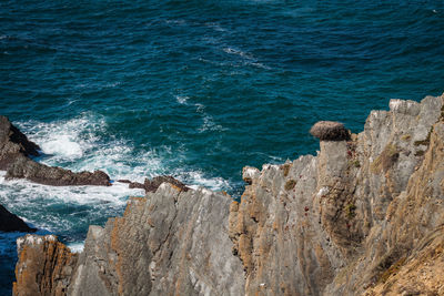 High angle view of rocks on beach