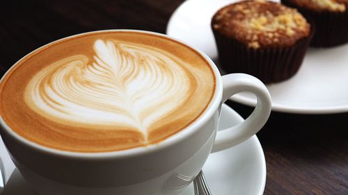 Close-up of cappuccino on table