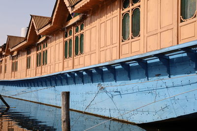 Low angle view of houseboat against sky, dal lake srinagar kashmir 