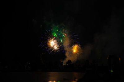 Firework display at night