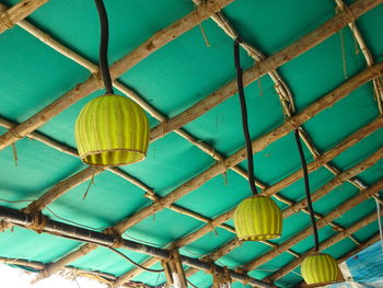 Low angle view of lantern hanging on ceiling