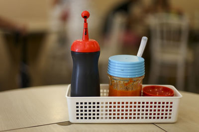 Close-up of food in bottles on table