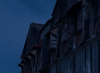 Low angle view of old building against sky