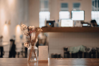 Close-up of glass vase on table