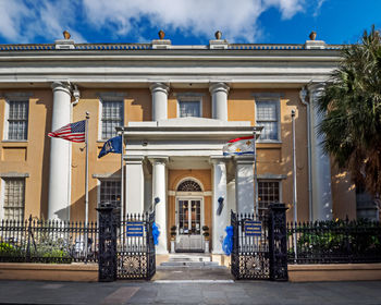 Facade of historic building against sky