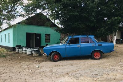 Vintage car outside building