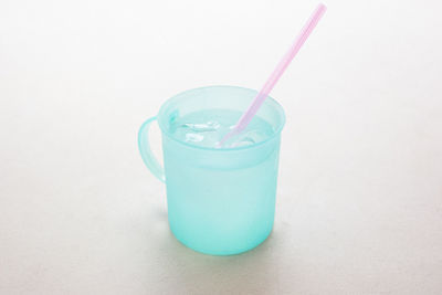 Close-up of drink against white background