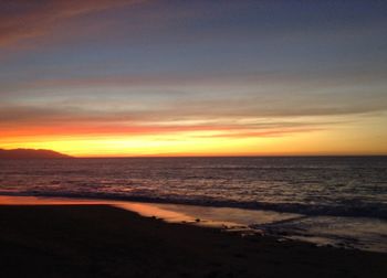 Scenic view of sea against dramatic sky