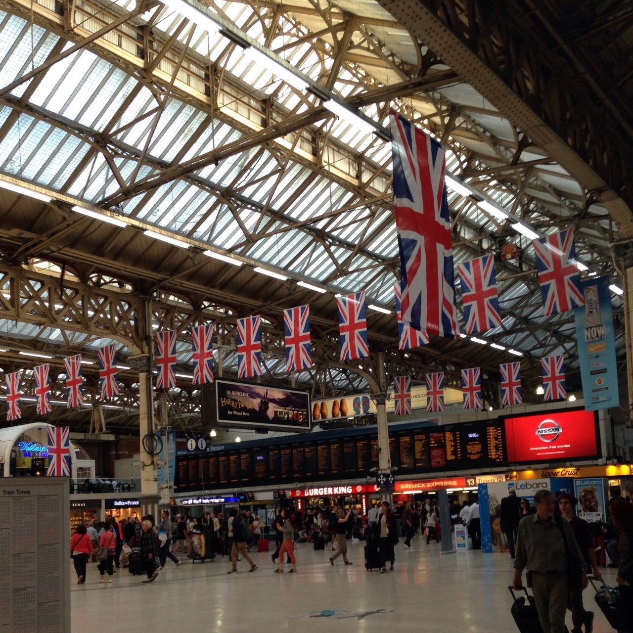 large group of people, person, men, crowd, indoors, lifestyles, architecture, built structure, leisure activity, illuminated, ceiling, mixed age range, shopping mall, city life, railroad station, travel, travel destinations, walking, tourism