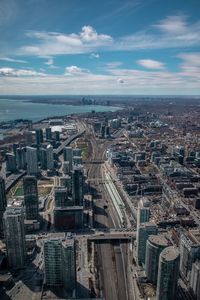 High angle view of buildings in city against sky