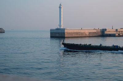 Sailboat sailing on sea