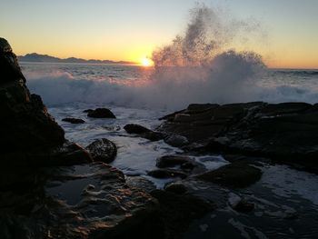 Scenic view of sea against sky during sunset