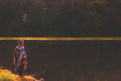 Man on lakeside