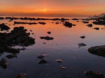 Scenic view of sea against sky during sunset