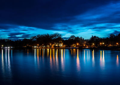 Scenic view of swimming pool against sky at night