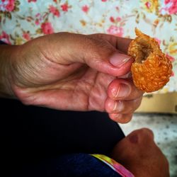 Close-up of woman holding food