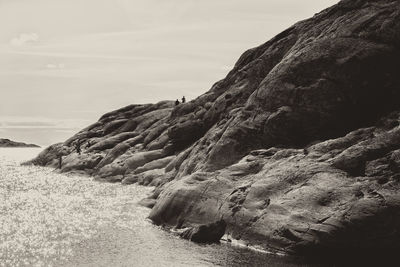 Rock formation on land against sky