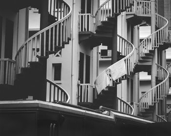 Low angle view of fire escape against buildings