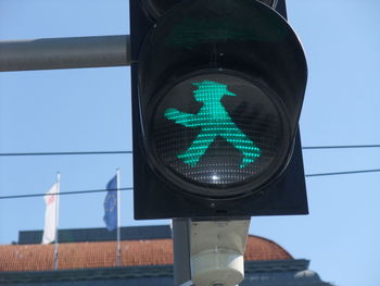 Close-up of illuminated road sign