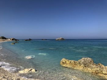 Scenic view of sea against clear sky