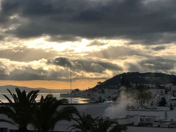 Scenic view of dramatic sky over sea during sunset