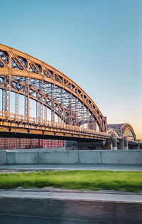 View of bridge over river against clear sky