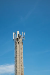 Telecommunication concrete tower with antennas