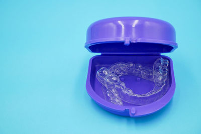 High angle view of blue bottle on table