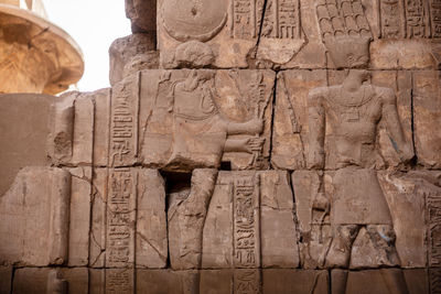 Different hieroglyphs on the walls and columns in the karnak temple. 