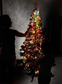 Illuminated christmas tree at home