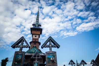 Low angle view of traditional building against blue sky