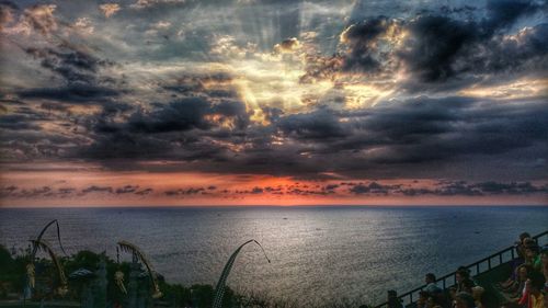 Scenic view of sea against cloudy sky