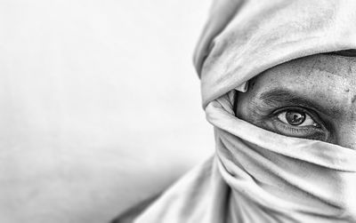 Portrait of man face covered with fabric