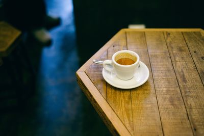 High angle view of coffee cup on table