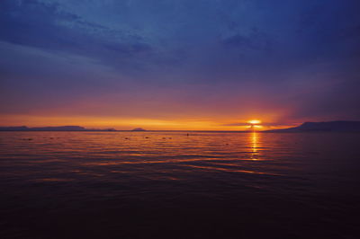 Scenic view of sea at sunset