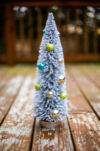 Close-up of christmas tree on table at home