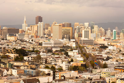 High angle view of buildings in city against sky