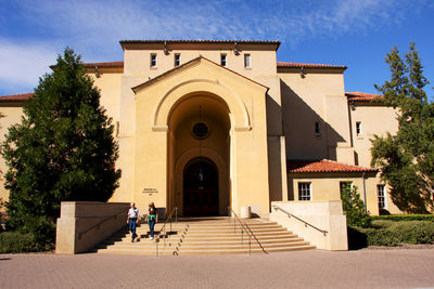 Facade of building against sky