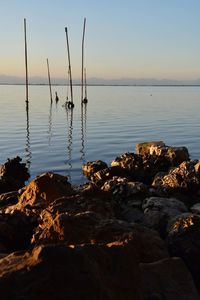 Scenic view of sea against sky during sunset