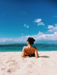 Full length of man on beach against sky