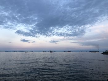 Scenic view of sea against sky at sunset