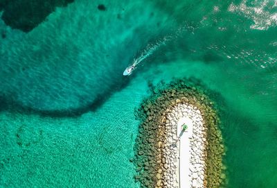 High angle view of surf on beach