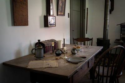 A historic view of a kitchen from the early days of america.