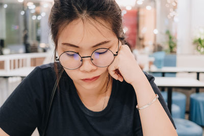 Woman sitting in cafe