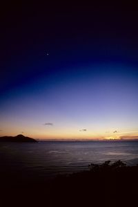 Scenic view of sea against sky at sunset